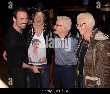 Gary Stretch, Mickey Rourke and Monty Cox attends the Screening Of #|#Through My Father's Eyes: The Ronda Rousey Story#|# at the TCL Chinese Theatre 6 on December 30, 2016 in Hollywood, California. Stock Photo