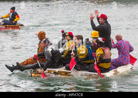 Poole, Dorset, UK. 1st Jan, 2017. Hundreds turn out to watch the New Years Day Bath Tub Race. A variety of unusual craft take to the water to race, having fun throwing eggs and flour, firing water cannons and capsizing competing craft. Credit: Carolyn Jenkins/Alamy Live News © Carolyn Jenkins/Alamy Live News Stock Photo