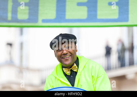 Westminster, London, 1st January 2017. Actor Colin Salmon participates with UFO steel drummers in the parade. The London New Year's Day Parade, LNYDP 2017, has been a turn-of-year tradition since 1987 and features several thousand performers from all around the world. Credit: Imageplotter News and Sports/Alamy Live News Stock Photo