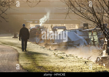 Man walks along the River Lea in the cold morning, London England United Kingdom UK Stock Photo