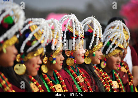 Kathmandu, Nepal. 30th Dec, 2016. Nepalese Gurung community girl smiles in a traditional attire during the celebration of Tamu Lhosar or Losar at Kathmandu, Nepal on Friday, December 30, 2016. Gurung community people celebrates this year Tamu Lhosar or Losar as a New Year of the Bird. © Narayan Maharjan/Pacific Press/Alamy Live News Stock Photo