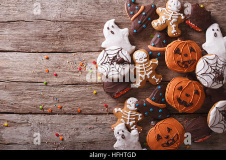 Funny delicious ginger biscuits for Halloween on the table. horizontal view from above Stock Photo