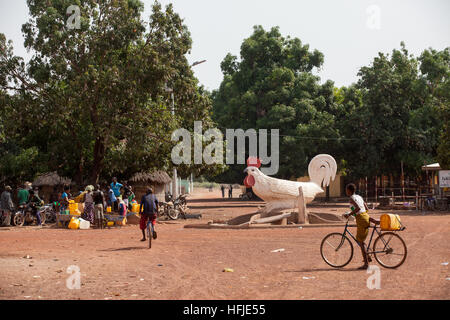 Baro village, Guinea, 1st May 2015:  People fetching water from a water point. Stock Photo
