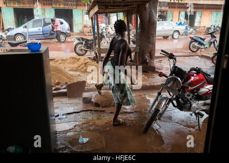 Kankan town, Guinea, 1st May 2015: street scenes while early seasonal rains fall in the town. Stock Photo