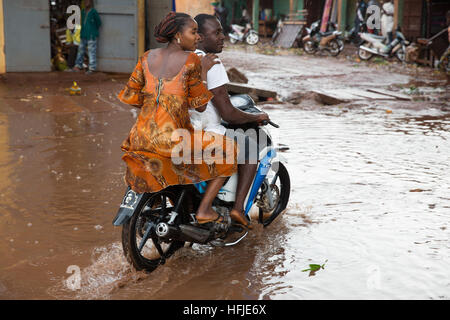 Kankan town, Guinea, 1st May 2015: street scenes while early seasonal rains fall in the town. Stock Photo