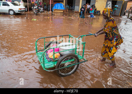 Kankan town, Guinea, 1st May 2015: street scenes while early seasonal rains fall in the town. Stock Photo