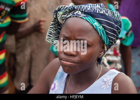 Koumban village, Guinea, 2nd May 2015; Fatoumata Diané, 25, married with one child is a fish seller.  She buys from Kankan every day. Stock Photo