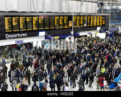 CROWDS AT WATERLOO STATION Very busy departures concourse with commuters at rush hour delays strikes London Waterloo station London EC1 Stock Photo