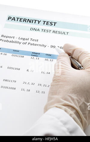 Paternity DNA test result chart form - doctor pointing at result value ...