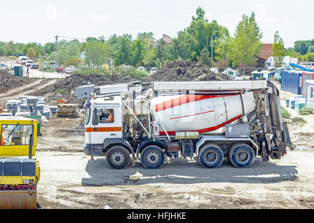 Mixer truck is transport cement to the casting place on building site. Stock Photo