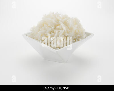 Rice in White Bowl Isolated on White Background Stock Photo