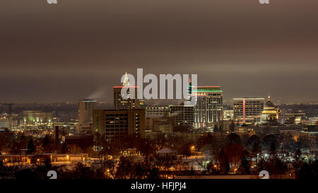 Night skyline of Boise Idaho in the winter with fog in the background Stock Photo