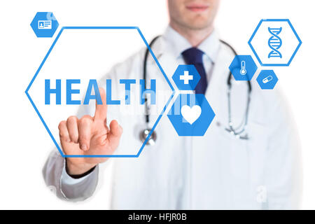 Healthcare concept with medical doctor touching a button with health text and icons on virtual interface, isolated on white background Stock Photo