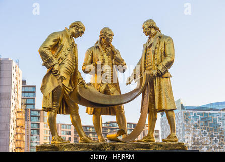 The gilded bronze statue of Matthew Boulton, James Watt and William Murdoch, Broad Street, Birmingham UK Stock Photo