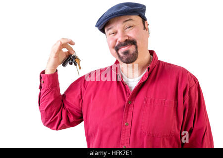 Proud privileged man holding a bunch of car keys after purchasing a new vehicle and fulfilling his dreams, isolated on white Stock Photo