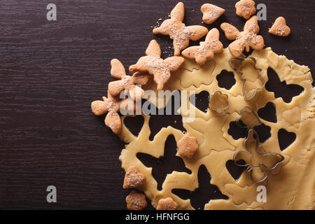 Cooking cookies figure in the form of butterflies close-up on the table. horizontal view from above Stock Photo