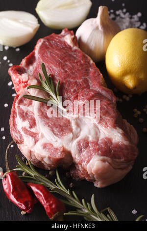 Pork Neck raw meat piece on wooden cutting board. wooden background. Top  view Stock Photo by composter-box