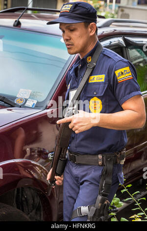 Armed security guard, Manila, Philippines Stock Photo