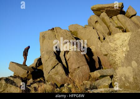man male standing on bluestones of Carn Menyn Carn Meini preseli Hills Pembrokeshire Wales Cymru UK GB Stock Photo