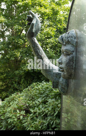 Detail of 'Alice Through The Looking Glass' sculpture by Jean Argent in the grounds of Guildford Castle, Guildford, Surrey Stock Photo