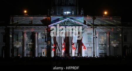 The Fidget Feet acrobatic group perform aerial contemporary dance against Dublin's Custom House as part of the city's New Year's eve celebrations. Stock Photo
