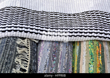Of domestic hand-woven patchwork on a table. Stock Photo