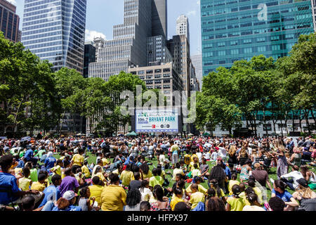 New York City,NY NYC Manhattan,Midtown,Bryant Park,public park,Broadway in Bryant Park,free concert,performance,audience,lunch crowd,sitting,stage,NY1 Stock Photo