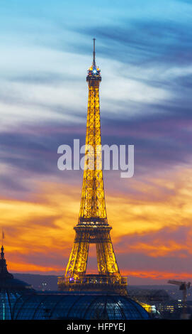 Paris, France-December 28; 2016 : The famous Eiffel tower at sunset.It is one of the most visited monuments in the world located on Champ de Mars in P Stock Photo