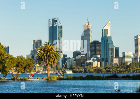 View across St James Mitchell Park and the Swan River to the city skyline at dawn, Perth, Western Australia, Australia Stock Photo