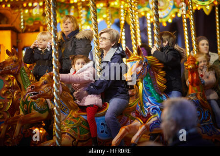 Ashton Tameside Christmas carousel ride   Christmas winter festive festival Christian holidays happy occasion December gifts presents buying season fa Stock Photo