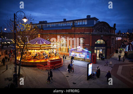 Ashton Tameside Christmas carousel ride   Christmas winter festive festival Christian holidays happy occasion December gifts presents buying season fa Stock Photo