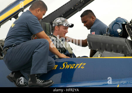 060227-N-0050T-115 El Centro, Calif. (Feb. 27, 2006) - Aviation Machinist's Mate 1st Class Patrick Palma and U.S. Marine Sgt. Deo Harrypersaud, prepare NASCAR driver and Busch Series car owner Dale Earnhardt Jr., prior to a VIP flight with the U.S. Navy flight demonstration team, 'Blue Angels' on board Naval Air Facility El Centro. McFarland, driver of the No. 88 U.S. Navy 'Accelerate Your Life' Chevrolet Monte Carlo who also received a flight during their visit, greeted locally stationed Sailors and Marines to shake hands and sign autographs after the flight U.S. Navy photo by PhotographerÕs  Stock Photo
