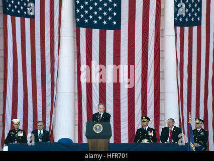 060529-N-2383B-014 Arlington, Va. (May 29, 2006) - President George W. Bush delivers remarks during Memorial Day ceremonies held in the amphitheater of Arlington National Cemetery. 'In this place where valor sleeps, we acknowledge our responsibility as Americans to preserve the memory of the fallen,' said the President.  Officially proclaimed and observed in May of 1868 as Decoration Day, it later became Memorial Day and is an honored day of remembrance for those who have died in service of the nation. U.S. Navy photo by Chief Photographer's  Mate Johnny Bivera  (RELEASED) US Navy 060529-N-238 Stock Photo