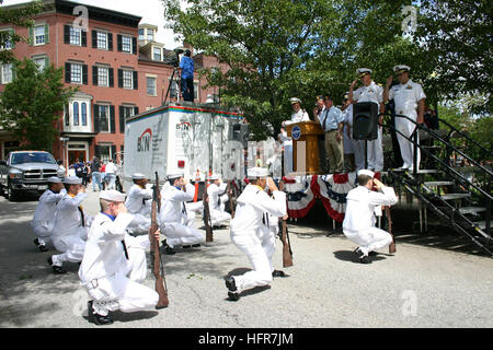 060611-N-8110K-047 Charlestown, Mass. (June 11, 2006) - The Sub Base Groton Drill Team salutes the viewing stand at the culmination of the Annual Bunker Hill Day Parade in Charlestown. This year's parade featured several Navy commands, many visiting Boston for a week of festivities and events during Boston Navy Week. Twenty-four such weeks are planned this year in cities throughout the U.S., arranged by the Navy Office of Community Outreach (NAVCO). NAVCO is a new unit tasked with enhancing the Navy's brand image in areas with limited exposure to the Navy.  U.S. Navy photo by Journalist 1st Cl Stock Photo