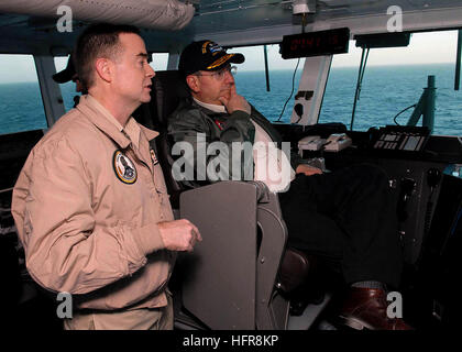 080127-N-1229B-003  PACIFIC OCEAN (Jan. 27, 2008) Secretary of the Navy (SECNAV) The Honorable Dr. Donald Winter sits in the captain's chair on the bridge of the Nimitz-class aircraft carrier USS Abraham Lincoln (CVN-72) while being briefed by Capt. Patrick Hall, commanding officer of Lincoln, about the capabilities of the ship. Winter visited Lincoln to observe the Anti-Submarine Warfare Exercise that is part of a joint task force exercise being conducted off the coast of Southern California. U.S. Navy photo by Mass Communication Specialist 3rd Class Patrick Bonafede (Released) US Navy 080127 Stock Photo