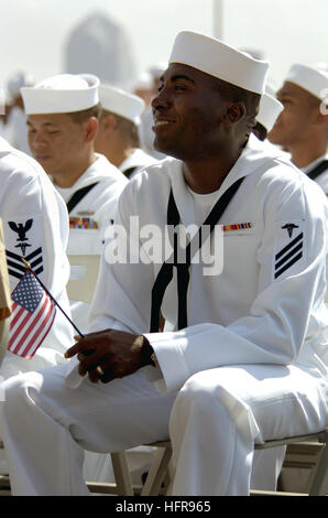 060822-N-0555B-183  Coronado, Calif. (Aug. 22, 2006) - Hospital Corpsman Victor Nwabuzor from Obosi, Nigeria smiles proudly after reciting the Oath of Allegiance during a U.S. Citizenship and Immigration Services (USCIS) swearing-in ceremony on the flight deck aboard USS Ronald Reagan (CVN 76). More than 85 service members from the Army, Navy, Marine Corps and Coast Guard from 29 countries around the world participated in the naturalization ceremony. Ronald Reagan is currently pier-side in its homeport at Naval Air Station North Island. U.S. Navy photo by Mass Communication Specialist 3rd Clas Stock Photo