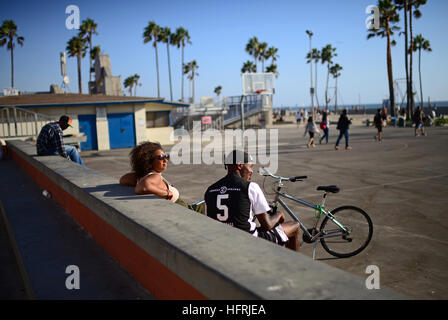 People enjoying a street basketball game, Venice Beach, California. Stock Photo