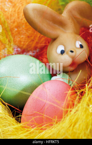 Marzipan Easter bunny with eggs in nest Stock Photo