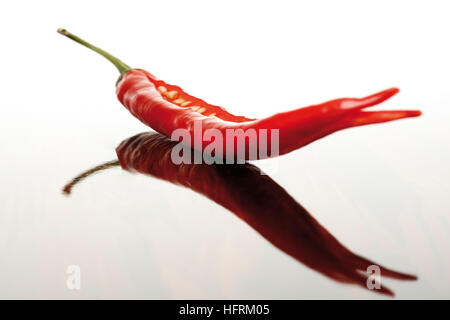 Red chili pepper, sliced-open (Capsicum) Stock Photo