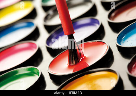 Paintbox and paintbrush Stock Photo