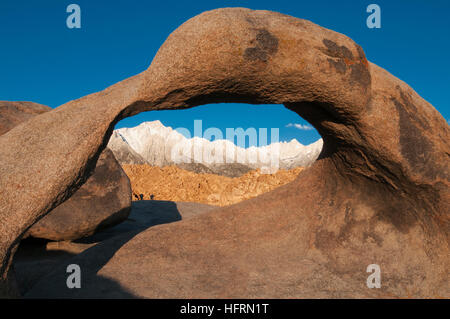Mount Whitney, the highest summit in the contiguous United States, viewed through Mobius Arch, Alabama Hills, California Stock Photo