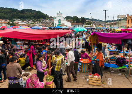 San Juan Chamula - May 11, 2014: Local people in a street market in the town of San Juan Chamula, Chiapas, Mexico Stock Photo