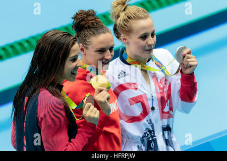 Rio de Janeiro, Brazil. 9 August 2016.   Katinka Hosszu (HUN) -C- gold Siobhan O'Connor (GBR) silver and Maya DiRado (USA) bronze medal winners in the Stock Photo