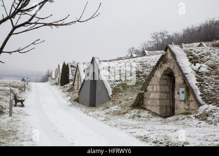Hercegkút, Hungary. 26th December, 2016. Wine cellars in the snow at the World Heritage site of Gombos-hegyi in Hercegkút. Stock Photo