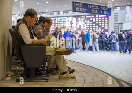 Hong Kong, Hong Kong. 01st Jan, 2017. 100,000 racing fans can't wait to try their luck at Hong Kong Jockey Club's 'Lucky Star January 1 Race Day' in Shatin Racecourse. 1st January 2017 © Alda Tsang/Pacific Press/Alamy Live News Stock Photo