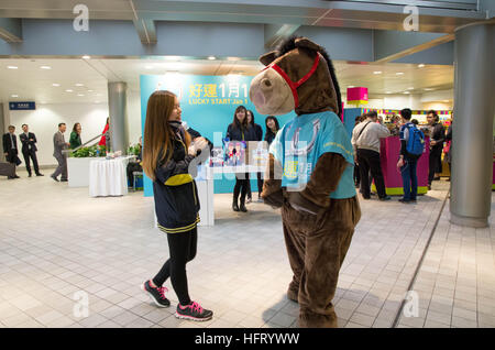 Hong Kong, Hong Kong. 01st Jan, 2017. 100,000 racing fans can't wait to try their luck at Hong Kong Jockey Club's 'Lucky Star January 1 Race Day' in Shatin Racecourse. 1st January 2017 © Alda Tsang/Pacific Press/Alamy Live News Stock Photo