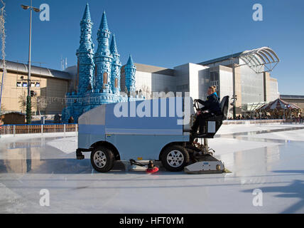 Ice resurfacing machine working on a temporary ice rink at The Mall shopping centre at Cribbs Causeway Bristol England UK Stock Photo