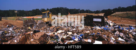 Heavy equipment at work in a sanitary landfill operation. Stock Photo