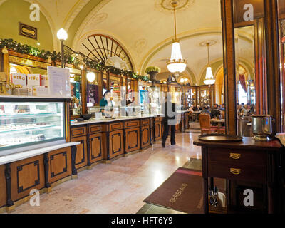 The classic interior of the famous Gerbeaud Kavehaz coffee house in the Budapest city center, Hungary Stock Photo