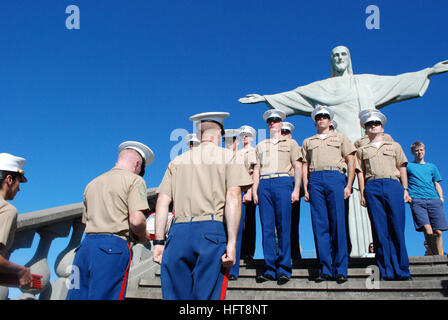 U.S. Marines assigned to Special Purpose Marine Air-Ground Task Force South, embarked aboard the amphibious assault ship USS America (LHA 6), participate in a promotion ceremony in Rio de Janeiro, Aug. 8, 2014. The America embarked on a mission to conduct training engagements with partner nations throughout the Americas before reporting to its new home port of San Diego. The America was set to be ceremoniously commissioned Oct. 11, 2014. (U.S. Navy photo by Lt. Dawn Stankus/Released) USS America visits the Americas 140808-N-TN557-117 Stock Photo